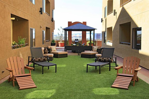 City View Apartments: Stylish patio with cityscape views for luxury living