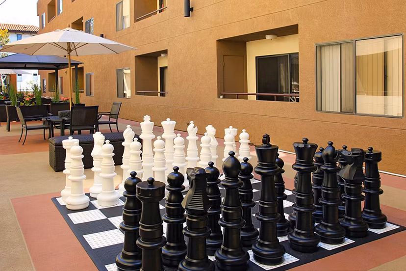 Chic patio with modern seating and city views at City View Apartments