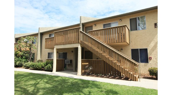 Ocean Breeze Apartments: Elegant view of luxury apartments near the beach