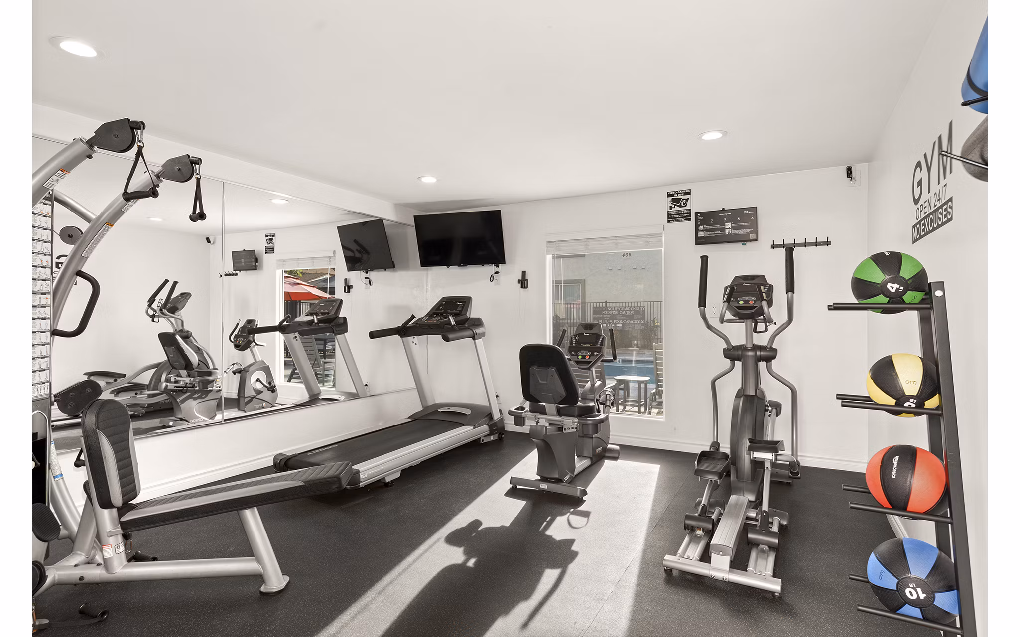 fitness center at Whispering Oaks Apartments 