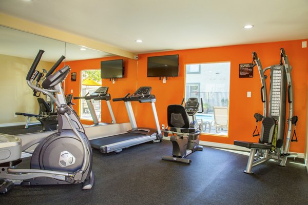 Fitness center with state-of-the-art equipment at Whispering Oaks Apartments
