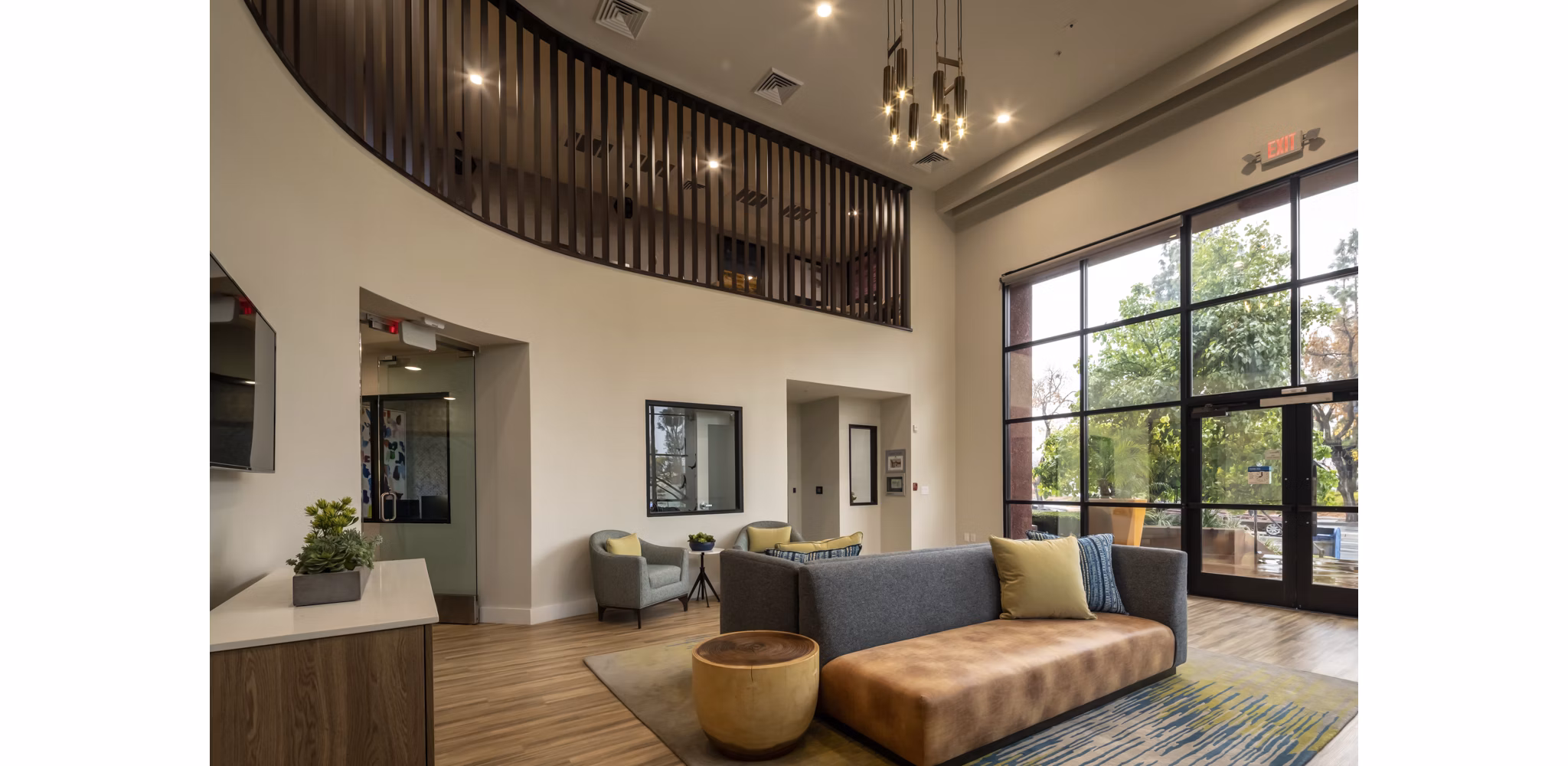 Stylish clubhouse with modern furnishings at The Pointe at Warner Center Apartments