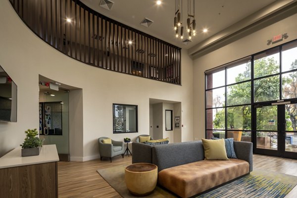Stylish clubhouse with modern furnishings at The Pointe at Warner Center Apartments