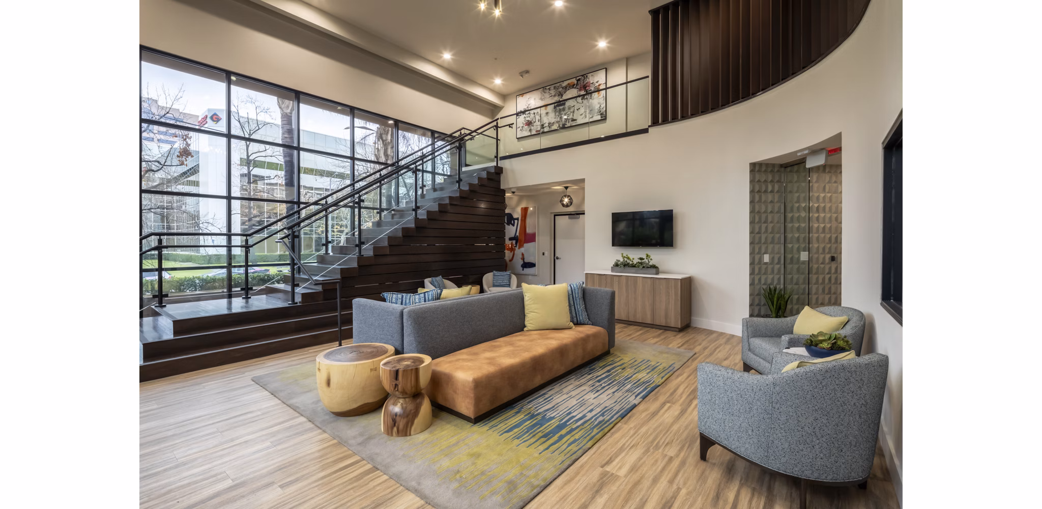 Clubhouse with modern design at The Pointe at Warner Center Apartments featuring luxurious amenities and social spaces