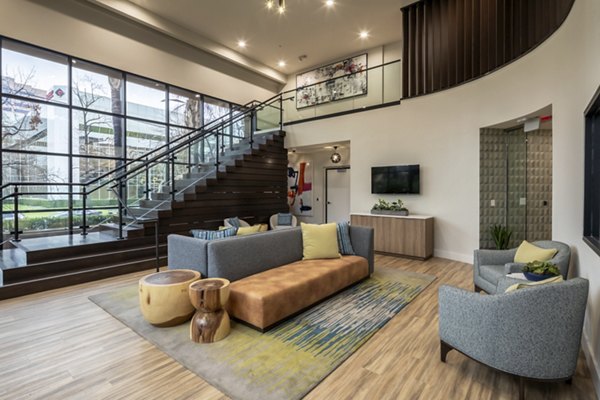 Clubhouse with modern design at The Pointe at Warner Center Apartments featuring luxurious amenities and social spaces