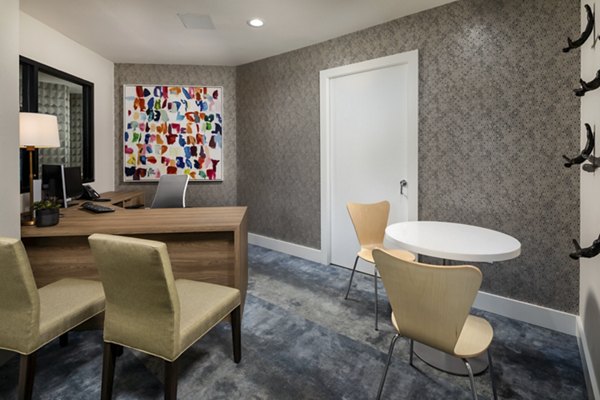Clubhouse featuring modern dÃ©cor and cozy seating at The Pointe at Warner Center Apartments, ideal for relaxation and social events