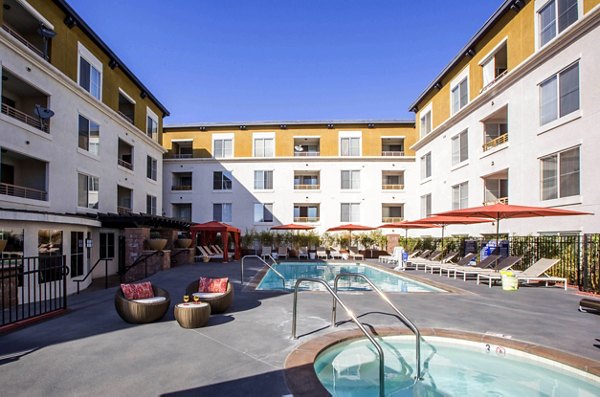 Relaxing pool area at The Pointe at Warner Center Apartments offering luxury living in the heart of Woodland Hills