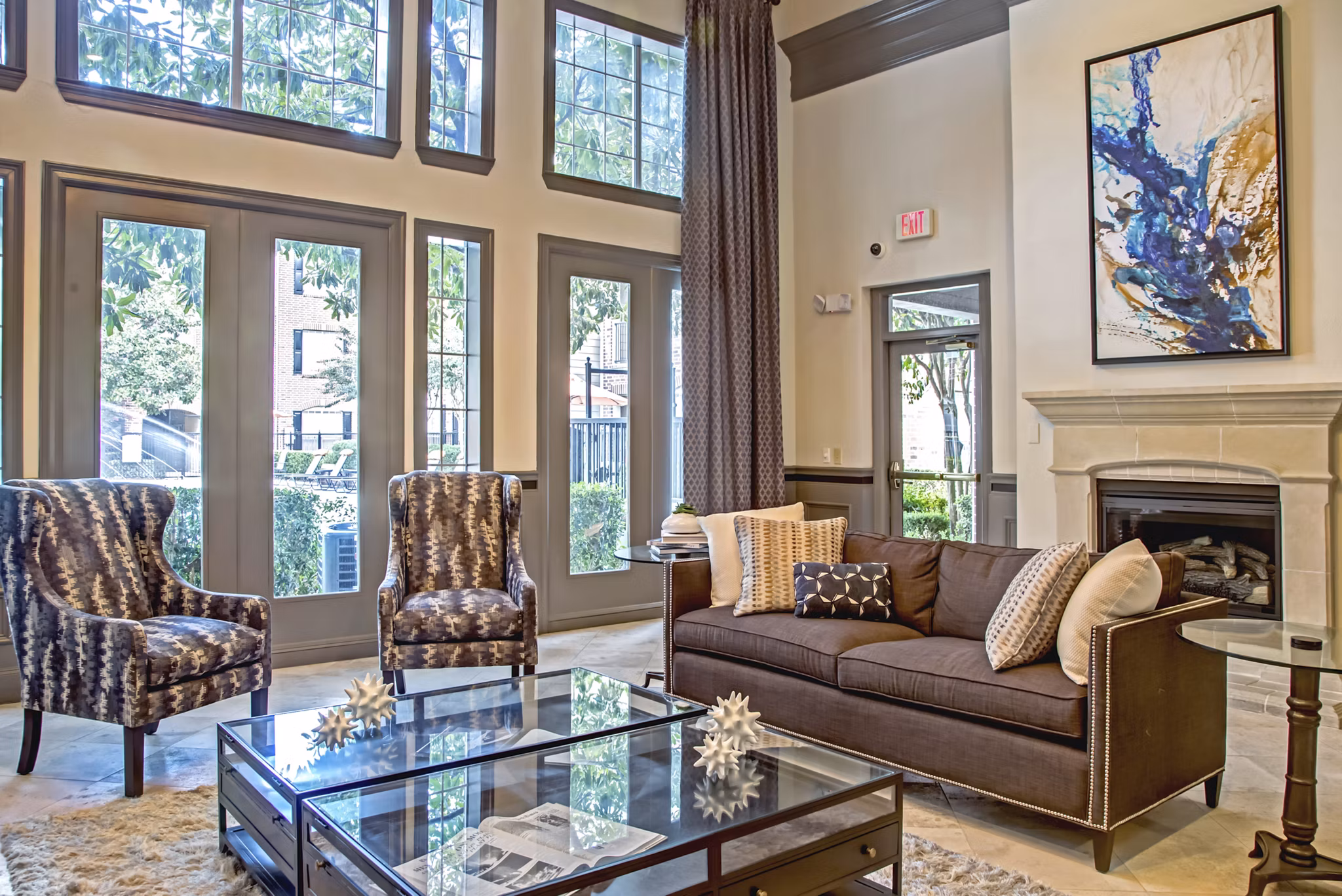 Elegant clubhouse with modern furnishings at Plaza at Westchase Apartments in a luxury residential community