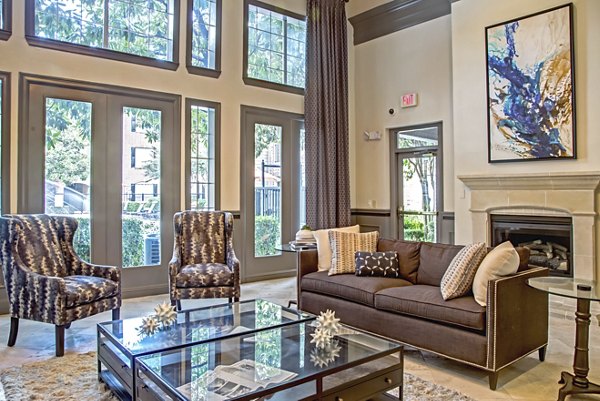 Elegant clubhouse with modern furnishings at Plaza at Westchase Apartments in a luxury residential community