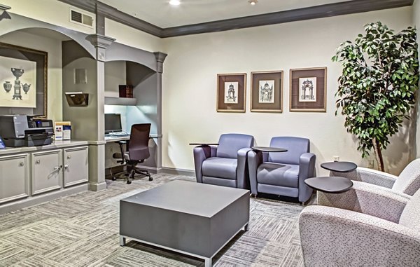 Elegant clubhouse featuring modern furnishings at Plaza at Westchase Apartments