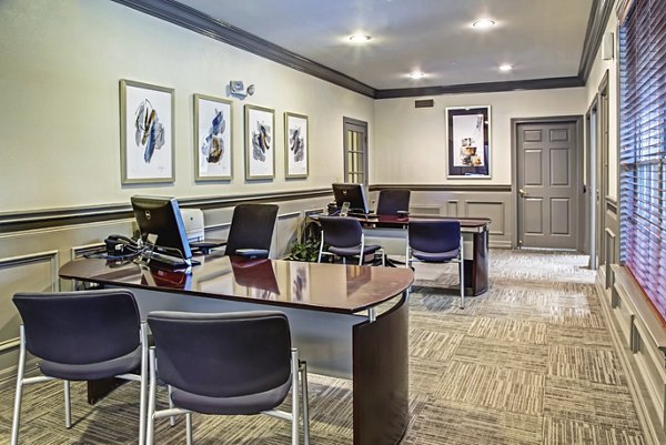 Clubhouse featuring modern seating and lighting at Plaza at Westchase Apartments