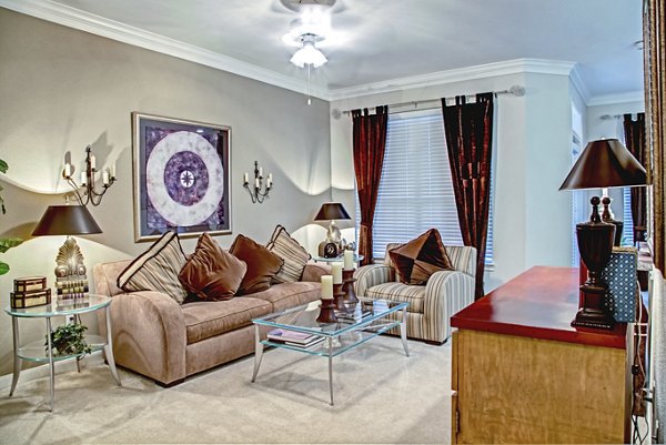 Spacious living room with contemporary design at Plaza at Westchase Apartments in Houston