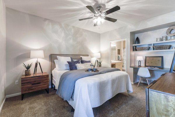 Cozy bedroom with modern decor at Avana Thornton Station Apartments