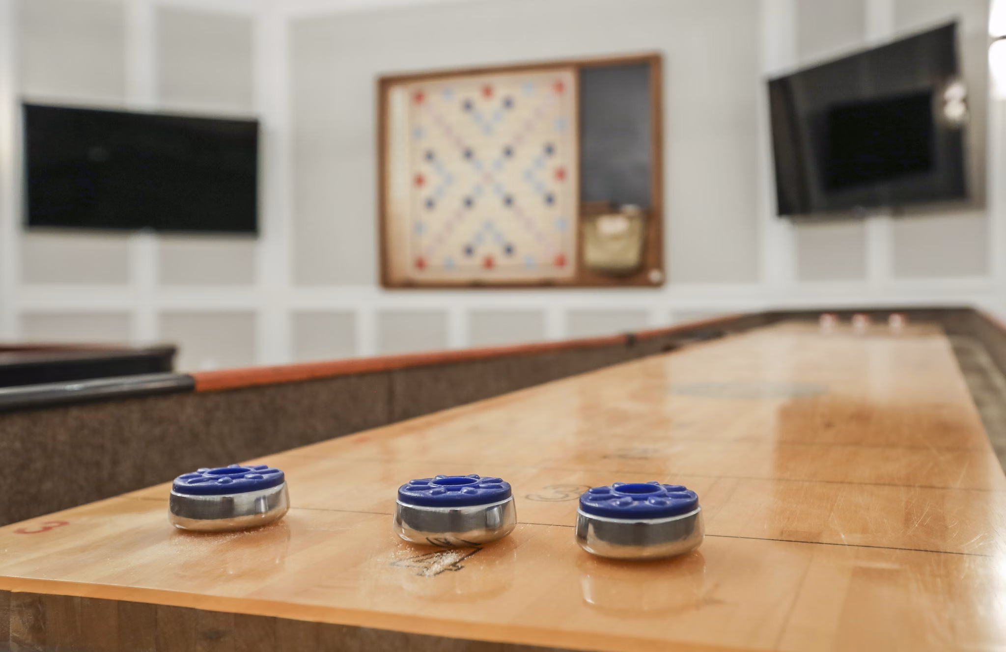 Game room with entertainment options at Avana Thornton Station Apartments