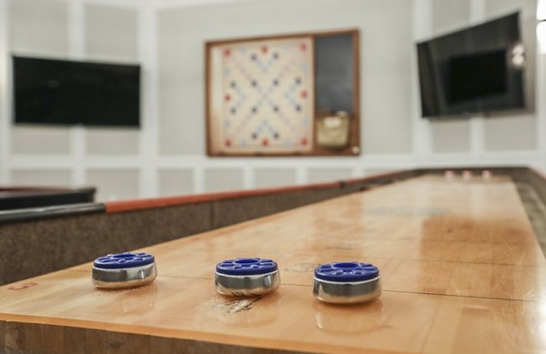 Game room with entertainment options at Avana Thornton Station Apartments