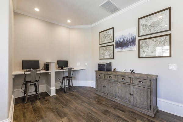 Avana Thornton Station: Modern business center with high-speed internet and workstations for luxury apartment residents