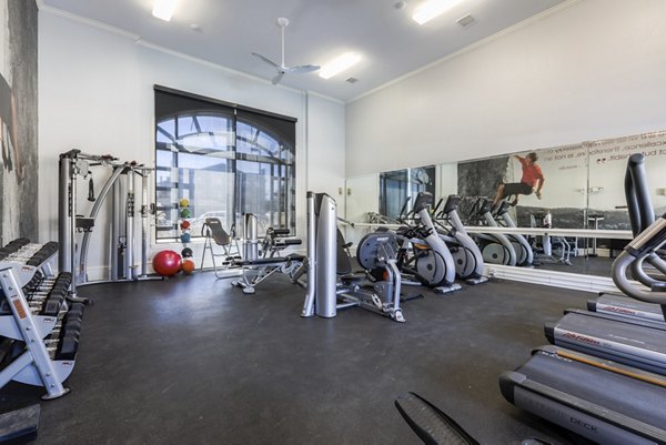 Fitness center with modern equipment at Avana Thornton Station Apartments