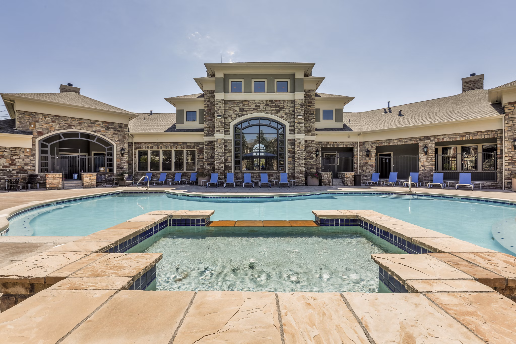 Inviting swimming pool at Avana Thornton Station Apartments offering luxury amenities and relaxation for residents