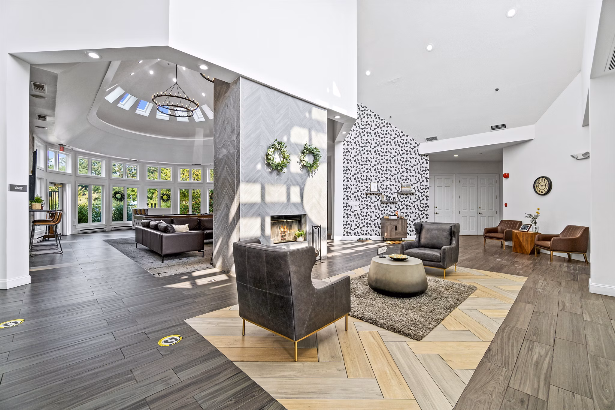 Stylish clubhouse lobby with modern decor at Ellipse at Fairfax Corner Apartments