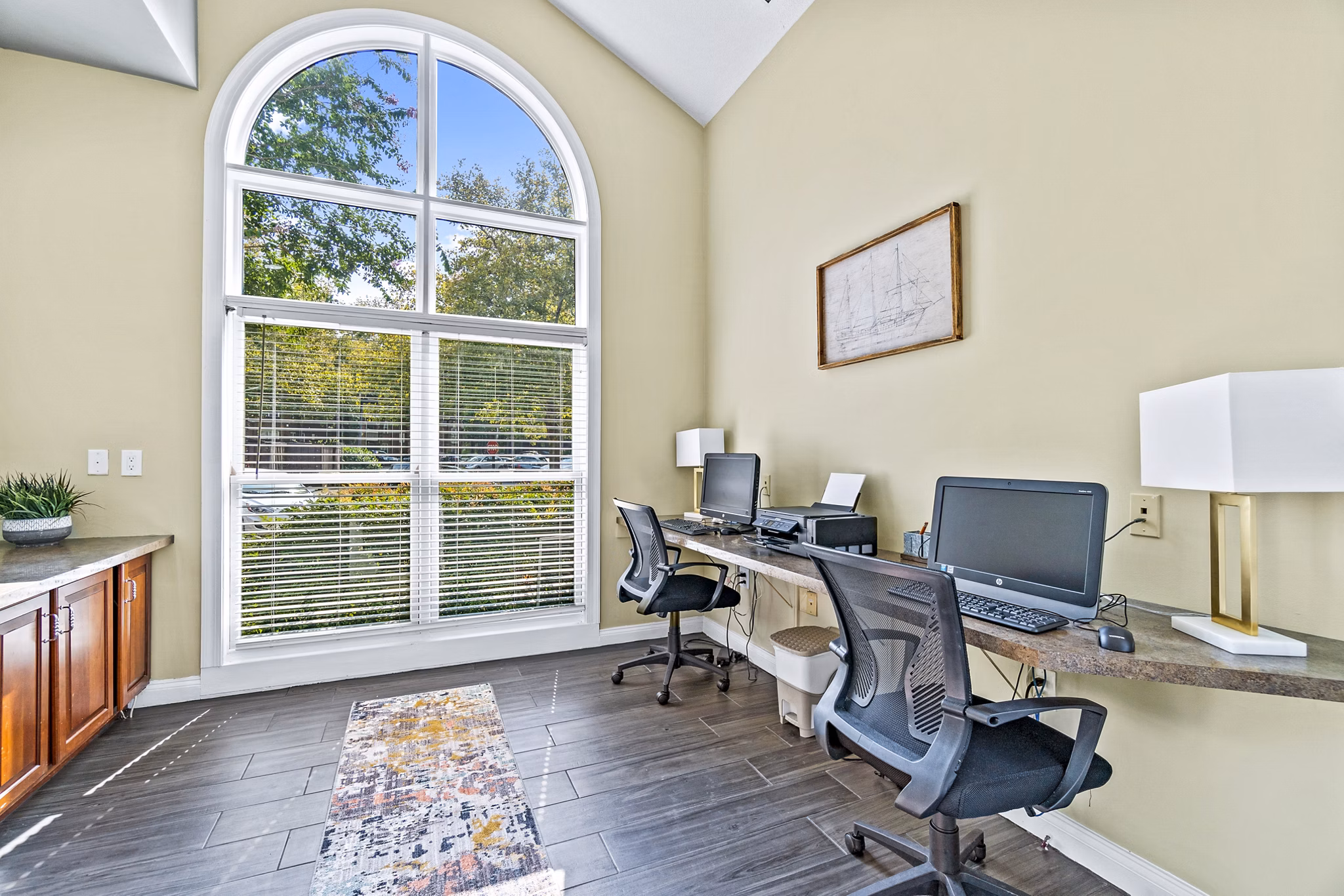 Business center with modern workstations at Ellipse at Fairfax Corner Apartments