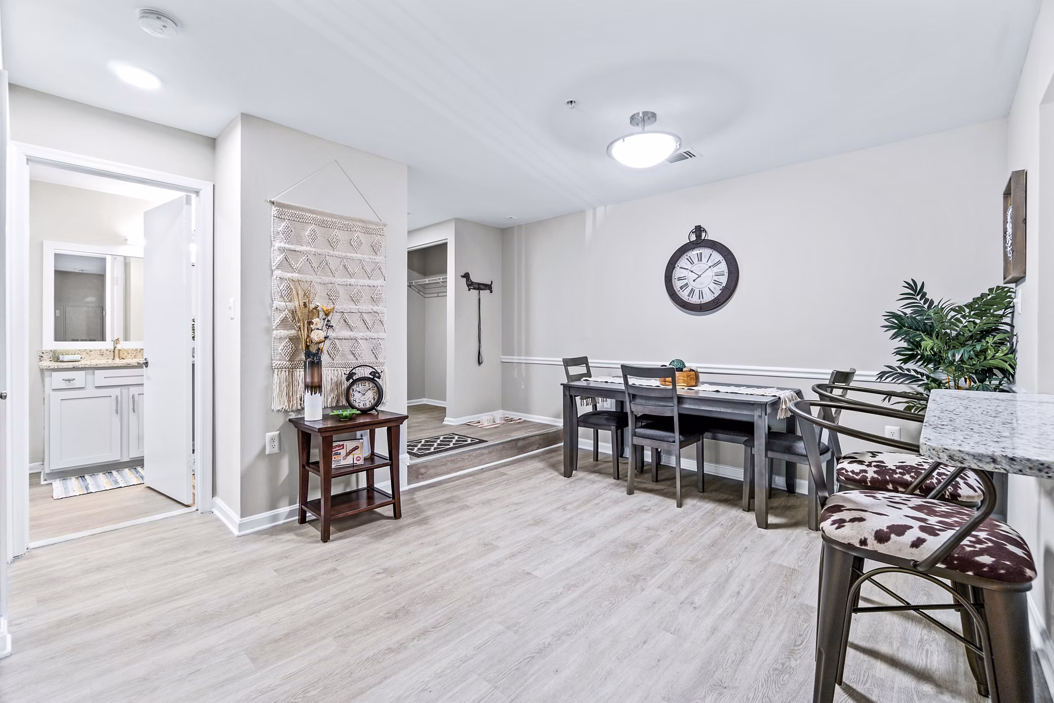Elegant dining room with modern furnishings at Ellipse at Fairfax Corner Apartments, ideal for luxury living
