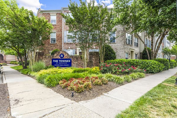 Townes at Herndon: Elegant of luxury apartment building in a serene residential neighborhood
