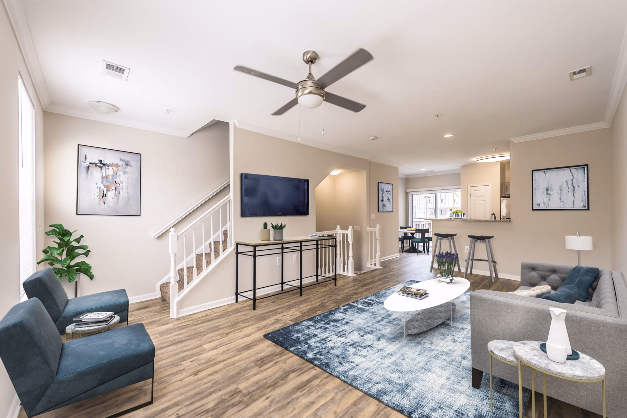 Spacious living room with modern furnishings in Townes at Herndon Apartments