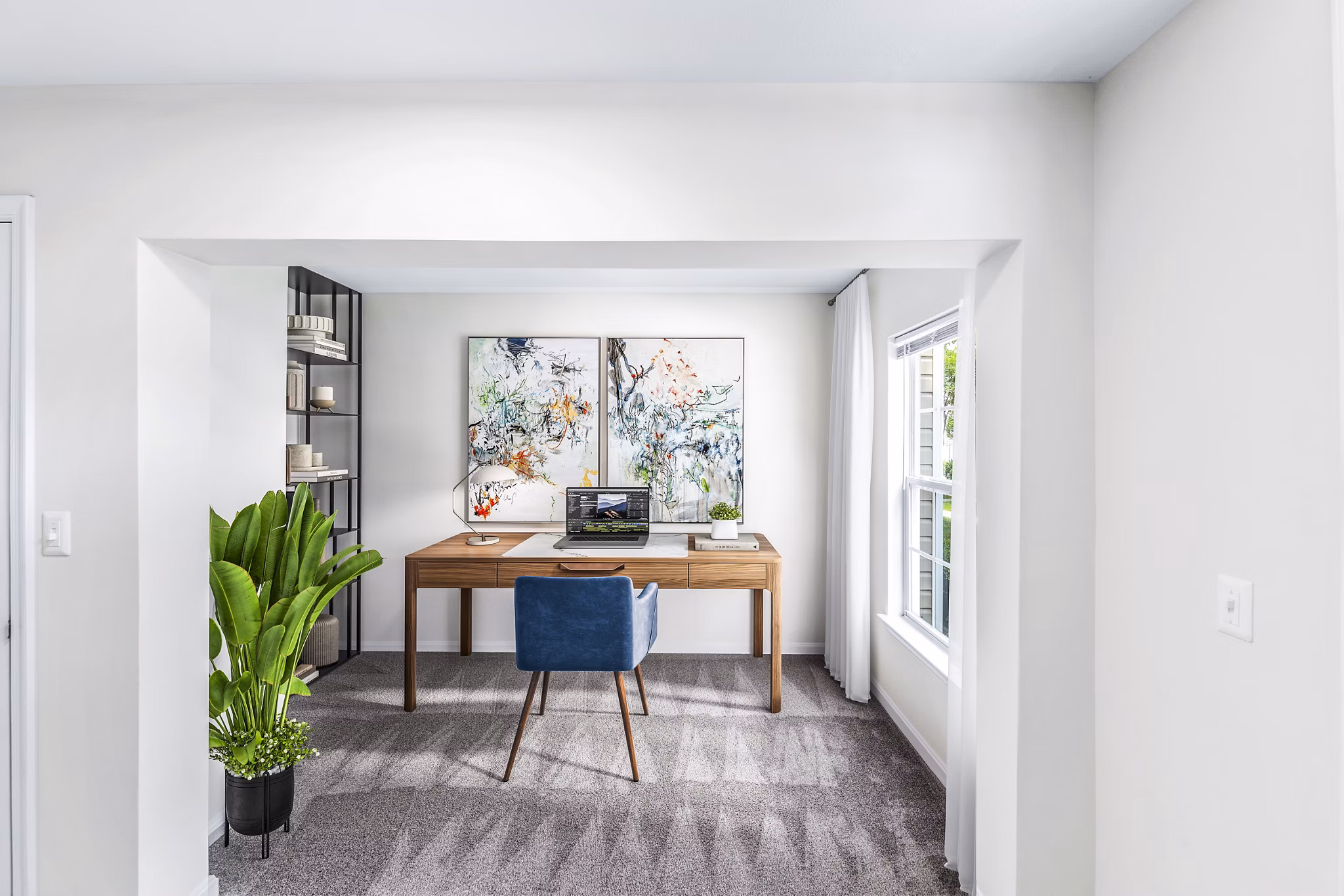 Cozy home office with ergonomic desk and chair at Townes at Herndon Apartments, perfect for remote work environments