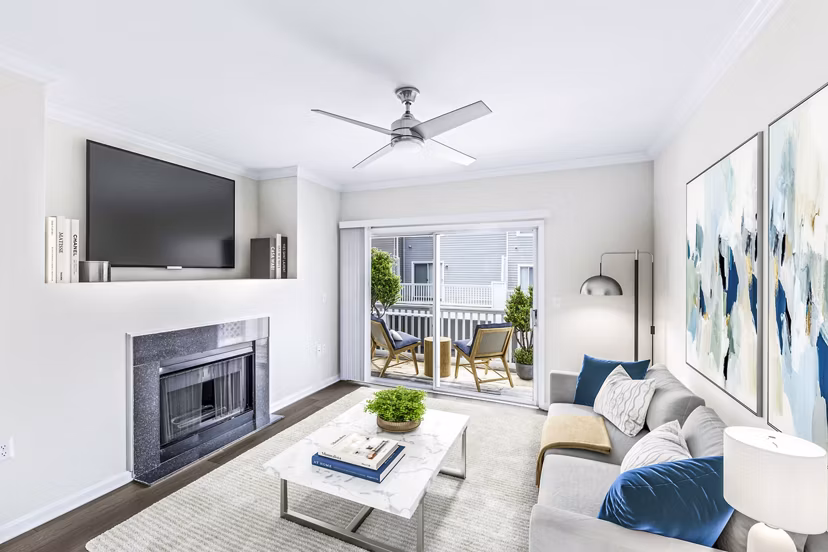 Spacious living room with modern decor at Townes at Herndon Apartments
