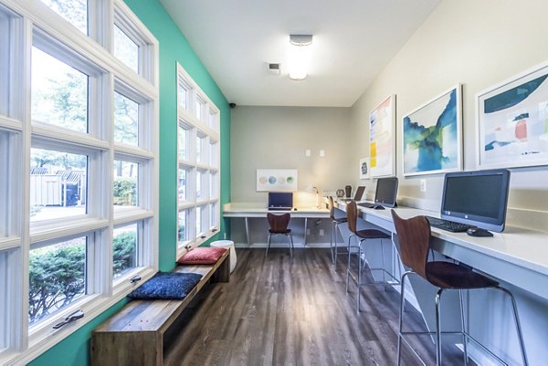 Clubhouse business center with modern workstations at Windsor at Fairlakes Apartments
