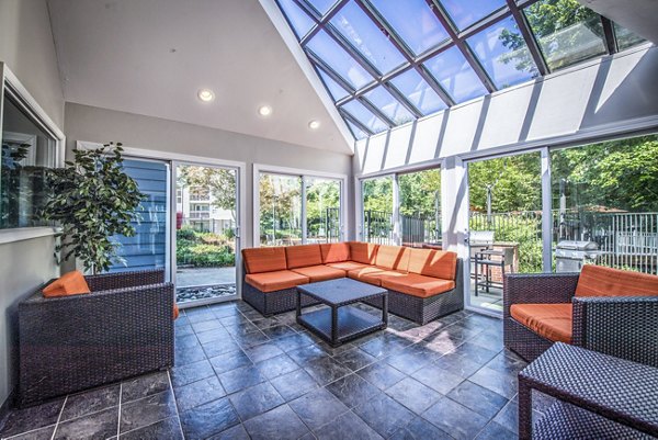 Indoor patio with cozy seating at clubhouse in Windsor at Fairlakes Apartments, offering luxury amenities in prime location
