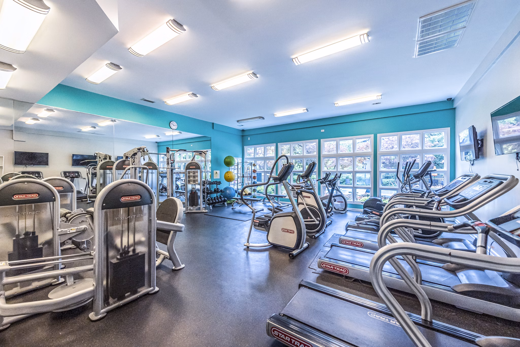 State-of-the-art fitness center offering modern equipment at Windsor at Fairlakes Apartments in Fairfax