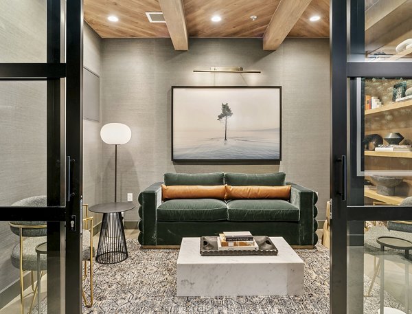 Clubhouse with modern design and comfortable seating at The Goodwin Apartments