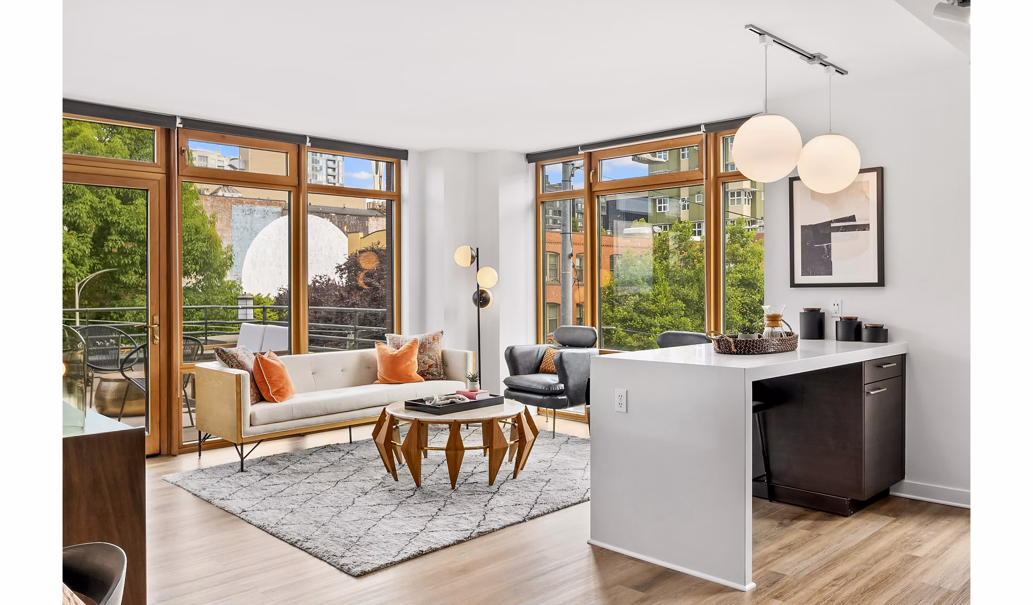 Spacious living room with contemporary decor in The Goodwin Apartments