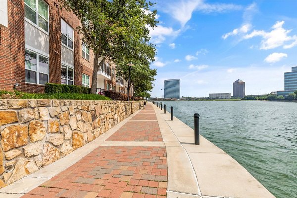 Lakeside Urban Center Apartments: Scenic view of luxury apartments near waterfront