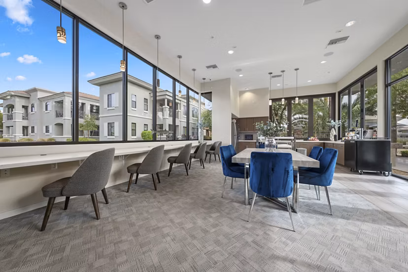 Indigo Apartments: Elegant clubhouse with modern seating and decor