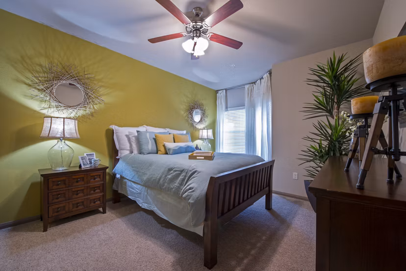 Spacious bedroom with modern decor at Montage at Cinco Ranch Apartments, ideal for luxury living near local attractions
