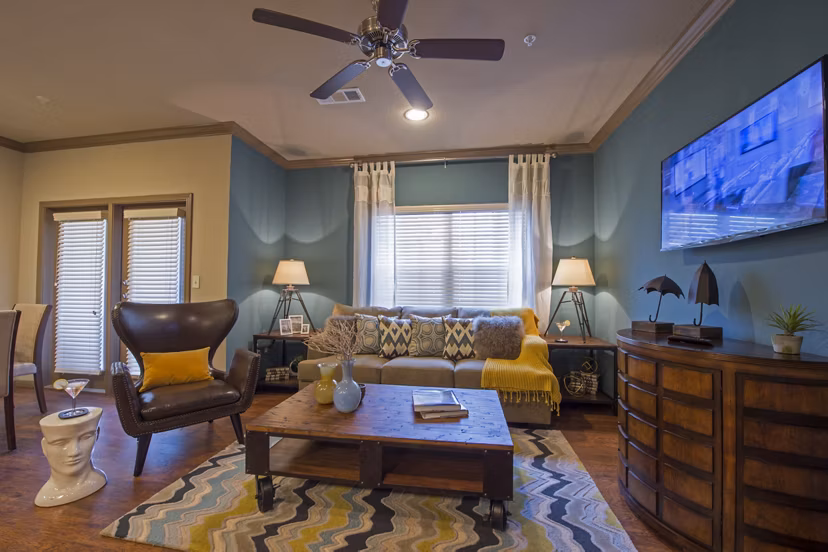 Spacious living room with elegant decor in Montage at Cinco Ranch Apartments