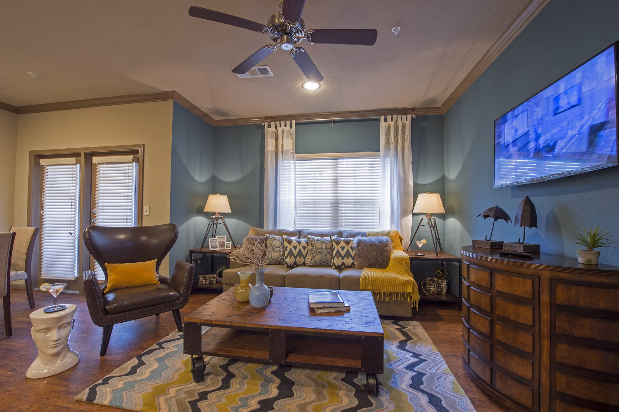 Spacious living room with elegant decor in Montage at Cinco Ranch Apartments