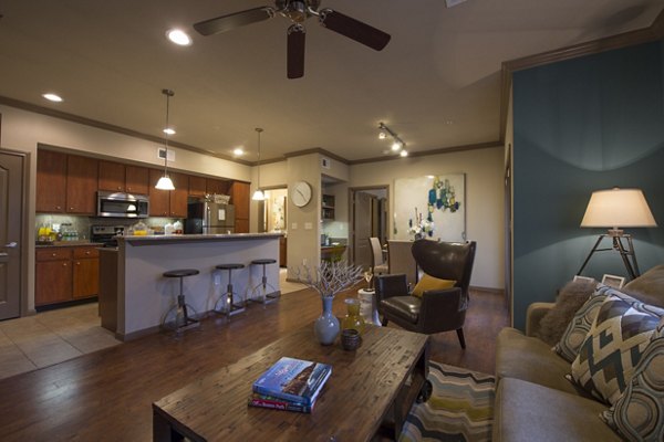 Living room with sleek modern decor at Montage at Cinco Ranch Apartments