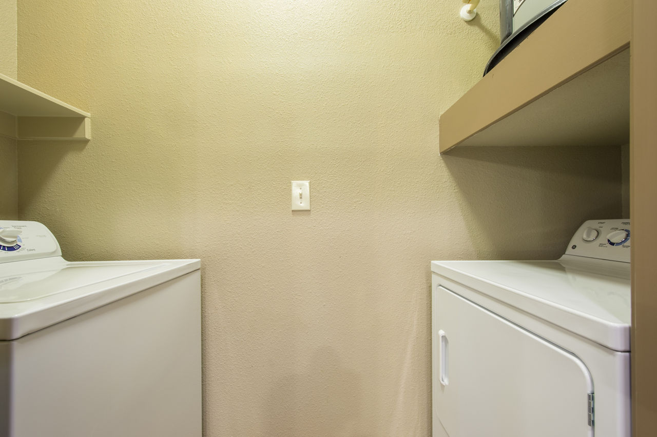 Laundry room at Montage At Cinco Ranch Apartments