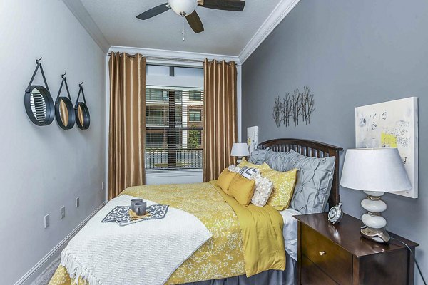 Elegant bedroom with modern decor at The Four Apartments
