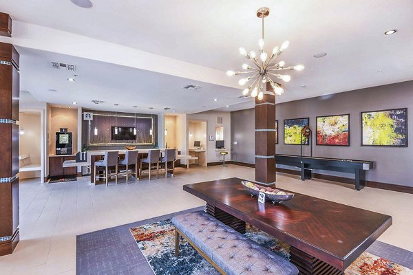 Modern clubhouse with elegant furnishings at The Four Apartments, showcasing luxury amenities for residents
