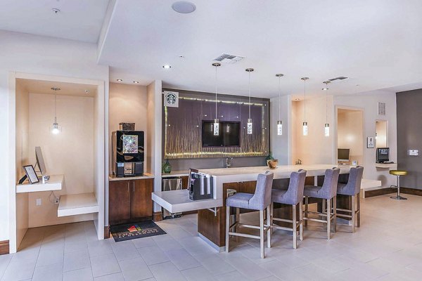 Clubhouse with modern furnishings at The Four Apartments, a luxury property by Greystar