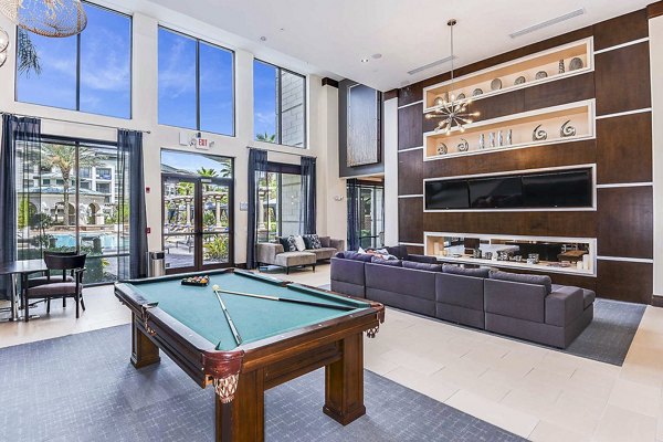 Clubhouse featuring modern design and community seating at The Four Apartments