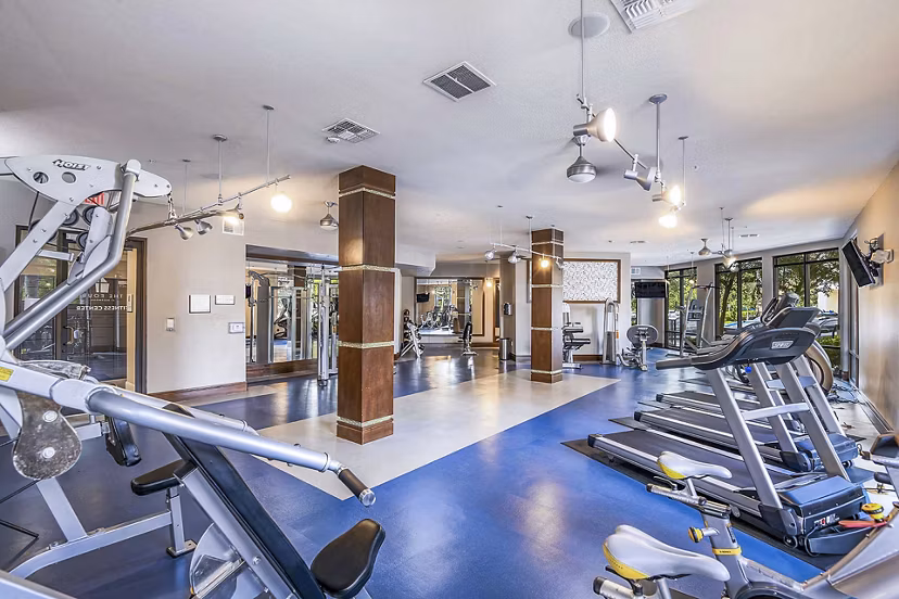 State-of-the-art fitness center with modern equipment at The Four Apartments