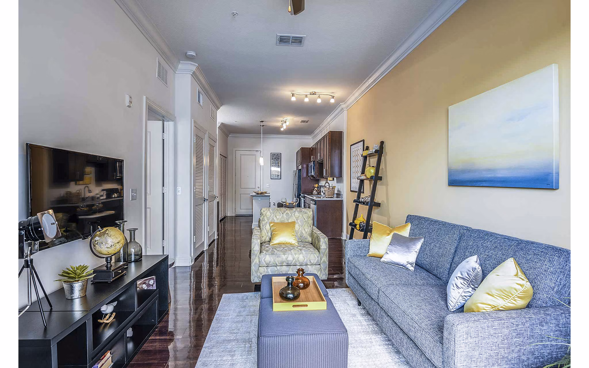 Cozy living room with modern furnishings in The Four Apartments