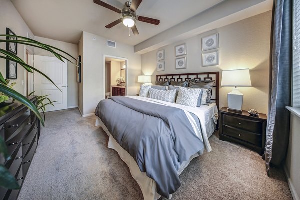 Modern bedroom with elegant decor in 33 West Apartments