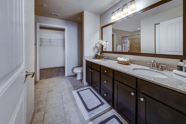 Modern bathroom with sleek fixtures at 33 West Apartments offering luxury living