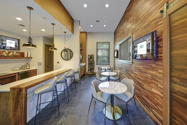 Contemporary clubhouse at 33 West Apartments with lounge seating and modern design